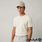 مدل مرد با کلاه بیسبالی Alo کرم، استایل کژوال مینیمال